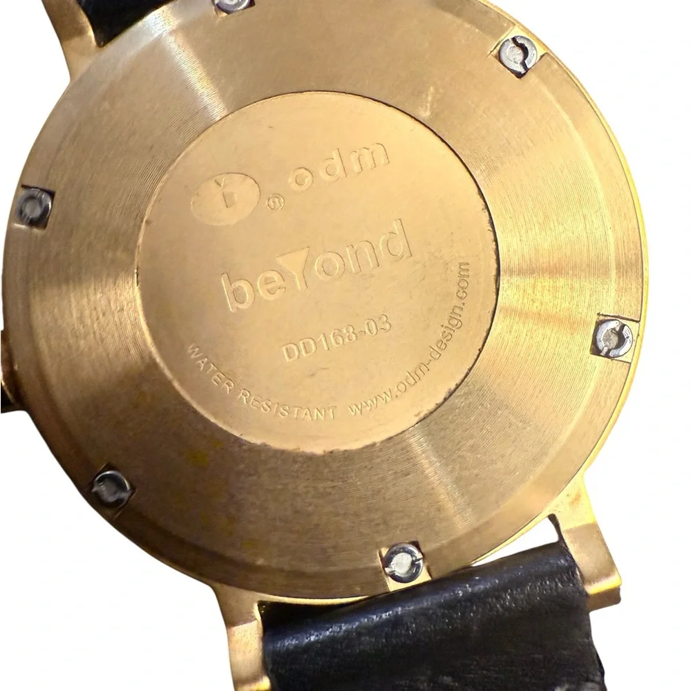 ODM Unisex “Beyond” Watch in Black with a Gold Face, Works, Excellent Condition